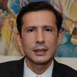 Photo of Norman Loayza, Director for DECIG